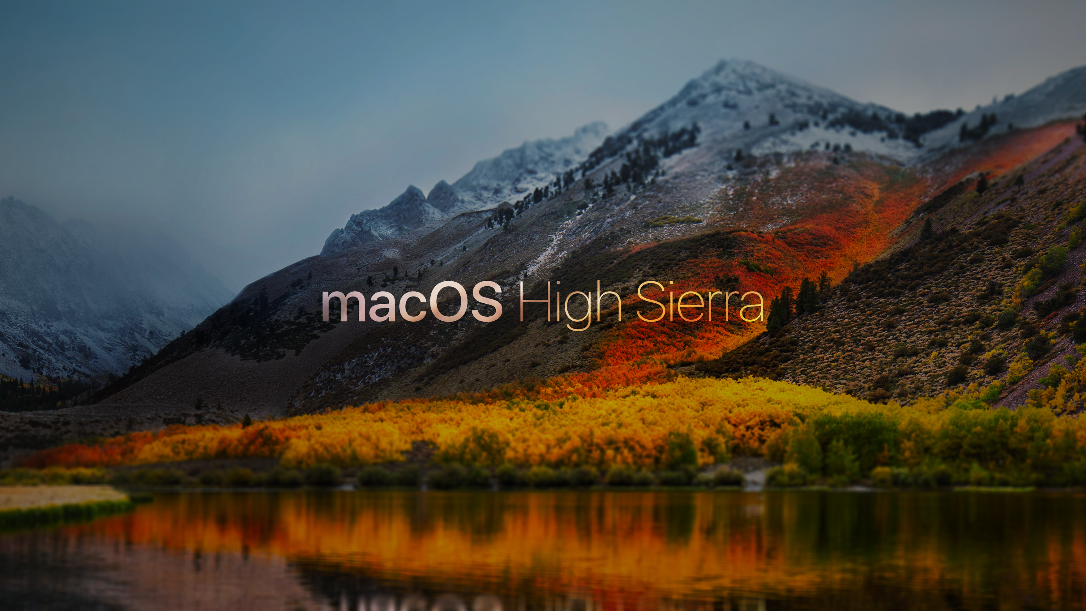 An image of the High Sierra mountains in autumn with the text macOS High Sierra written across it.