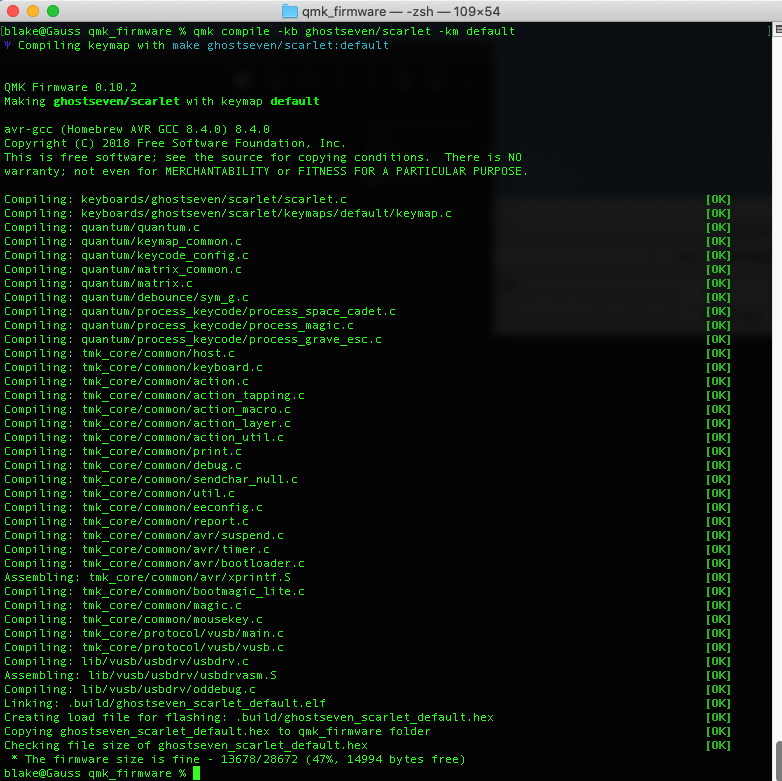 A screenshot of the terminal showing QMK firmware being successfully compiled for the test keyboard