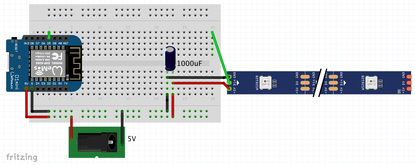 A circuit diagram, showing a esp8266 microcontroller on a perfboard, wired to it is a led strip with a barrel jack for power and a 1000uF capacitor.